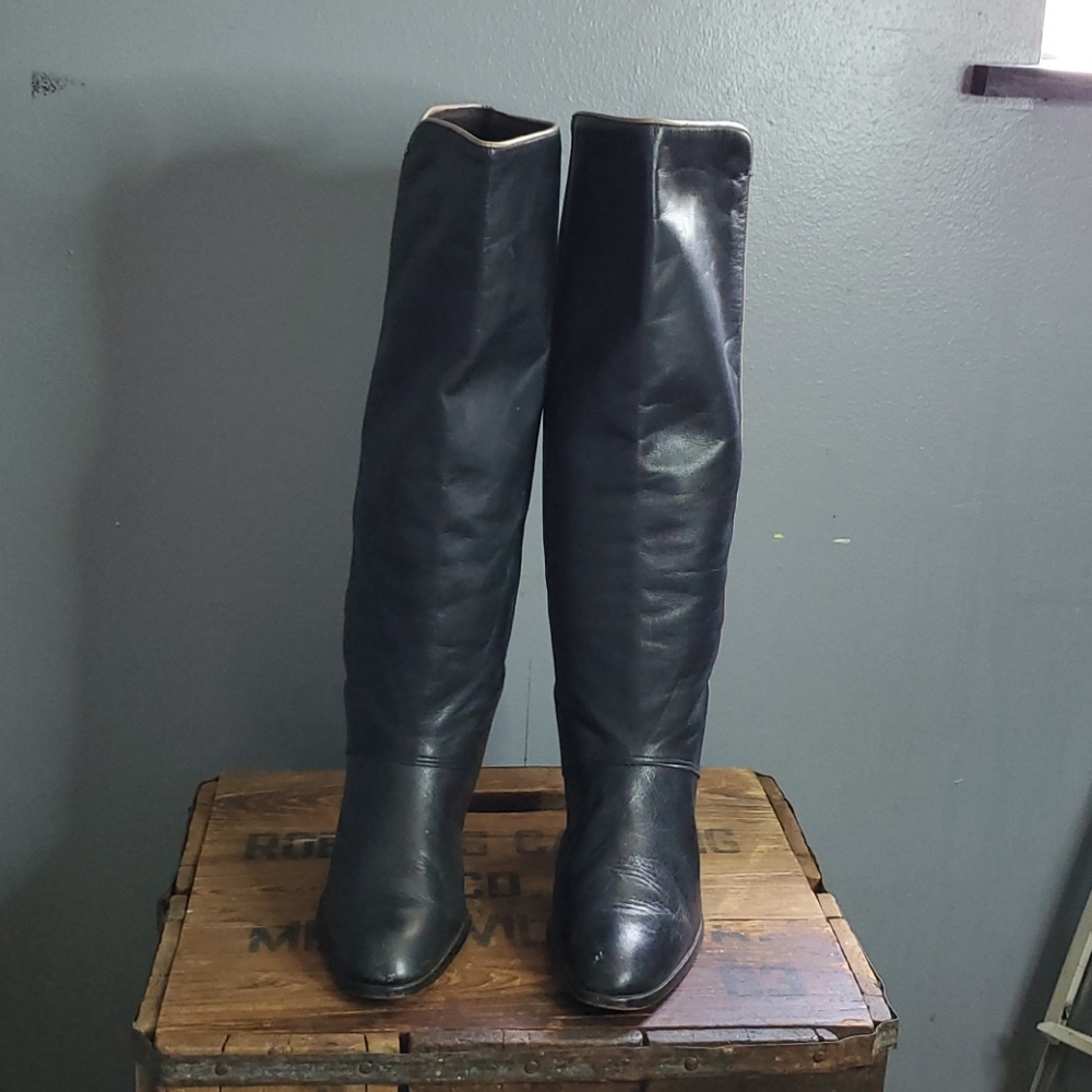 Black boots with tan trim size 6.5